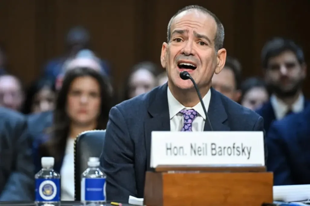 Credit Suisse investigator alleges he was dismissed for not hiding the facts about the bank's connections to the Nazi regime.