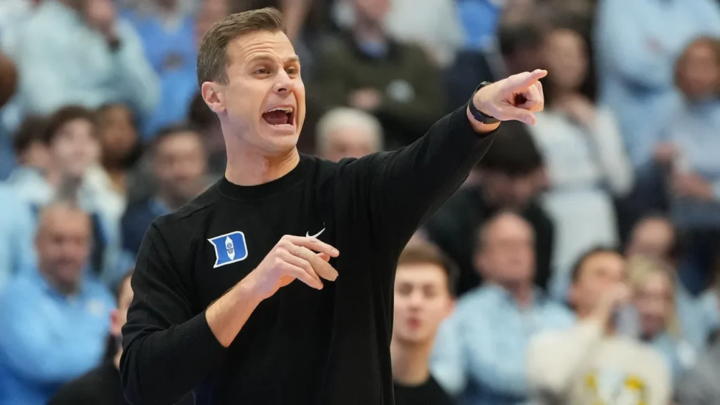 Duke staff members were 'hit in the face' during the UNC celebration, according to the coach.