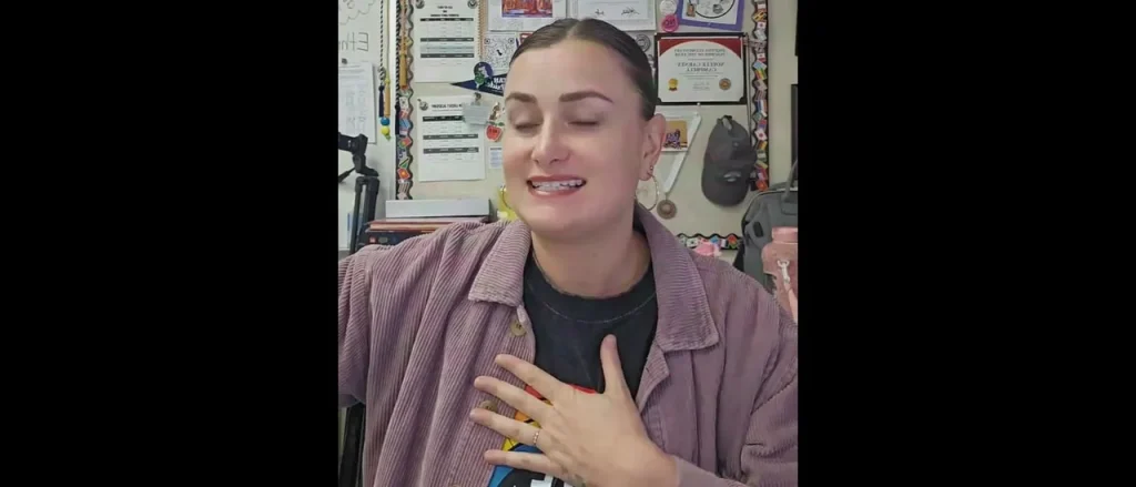 Educator with a Pride flag argues that 'MAGA teachers' should not be present.