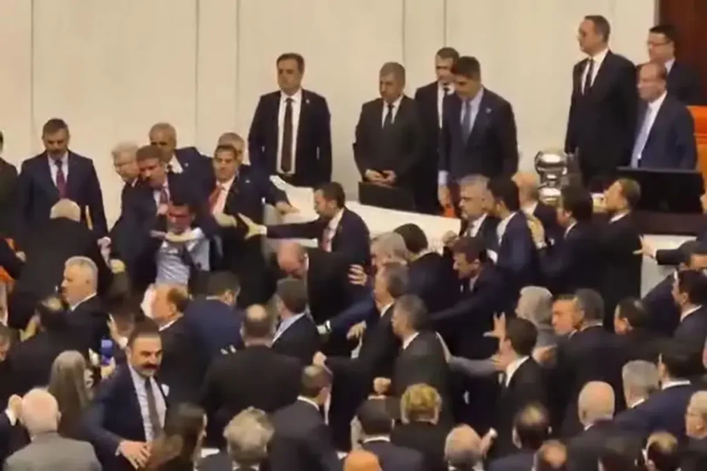 Fight breaks out in Turkish parliament as two parties argue over justice minister's appointment.