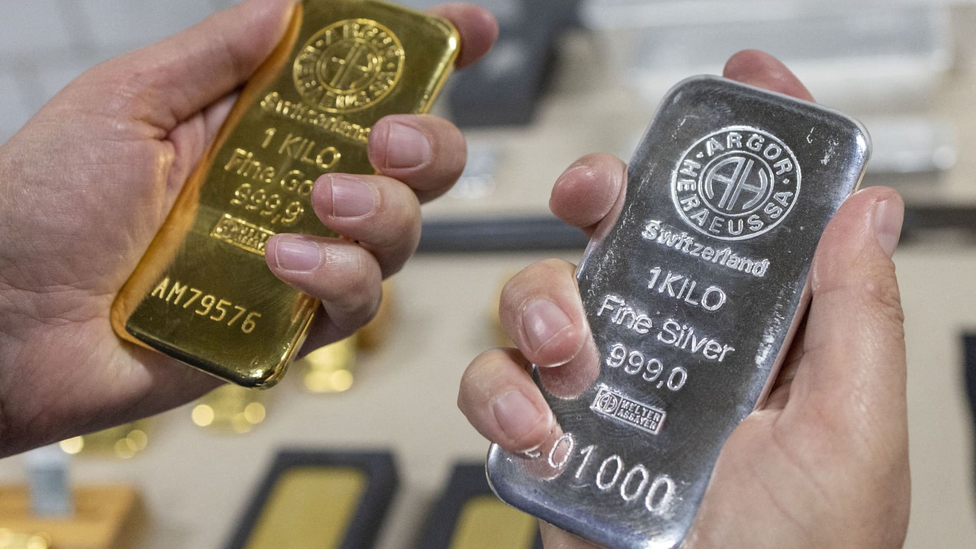 Gold and silver drop more as margin increase prompts selling
