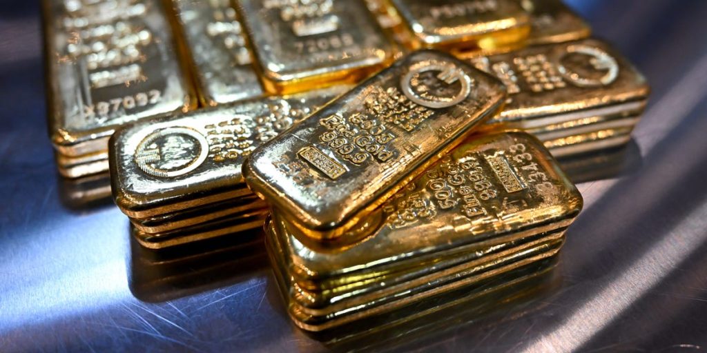 Gold enthusiasts are excited about predictions that the metal's price could more than double. Here's the story behind the popular forecast.