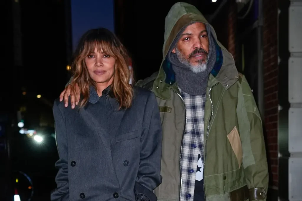 Halle Berry stays warm during a cozy NYC stroll with boyfriend Van Hunt, reportedly taking her time with marriage.