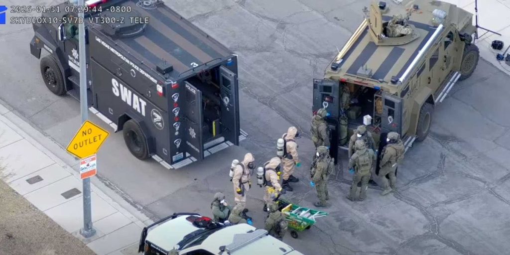 Hazmat and SWAT teams conduct a raid on a Las Vegas home connected to a COVID and Ebola lab.