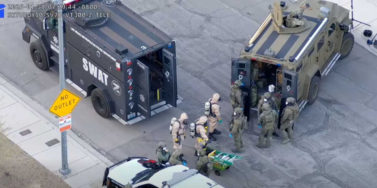 Hazmat and SWAT teams conduct a raid on a Las Vegas home connected to a COVID and Ebola lab.