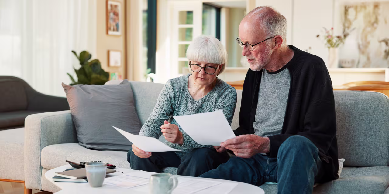I'm 61. My wife and I have saved $1 million and will receive $14,000 monthly in pensions. We own three homes but won't pay them off for another 28 years. Is retirement possible for me next year?