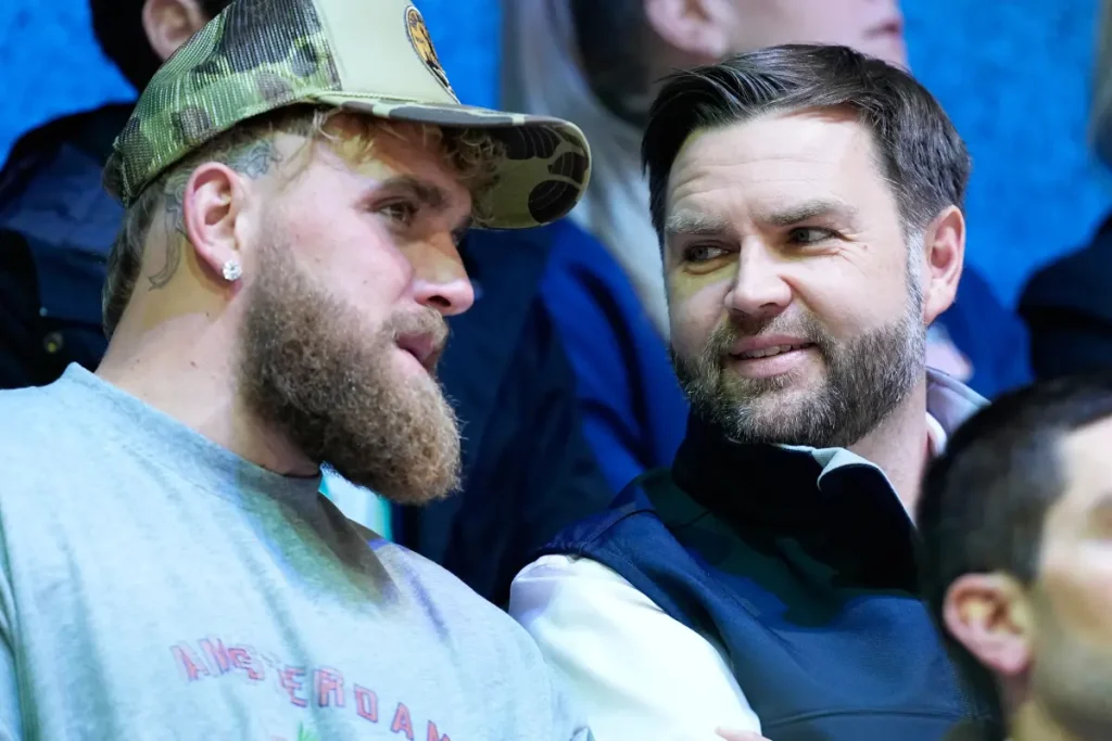 JD Vance and Jake Paul talk during the impressive victory of the US women's hockey team against Finland