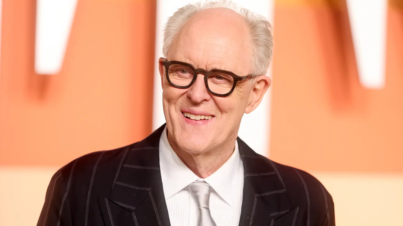 John Lithgow supports his role in 'Harry Potter' even with Rowling's 'ironic' views on transgender issues.