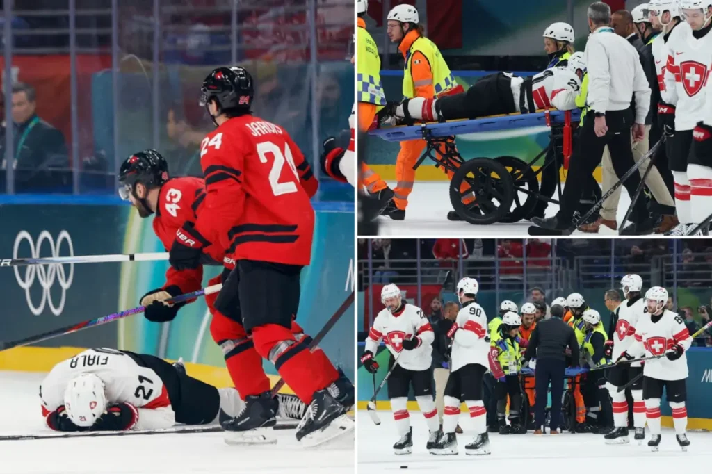 Kevin Fiala from Switzerland carried off on a stretcher and hospitalized