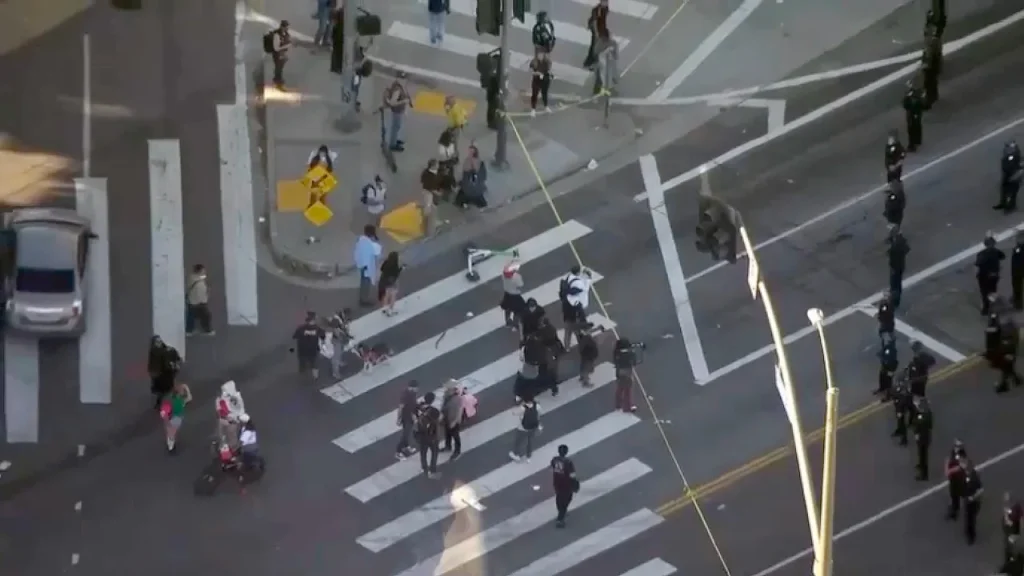 Police in Los Angeles give dispersal order following violent student protest against ICE.