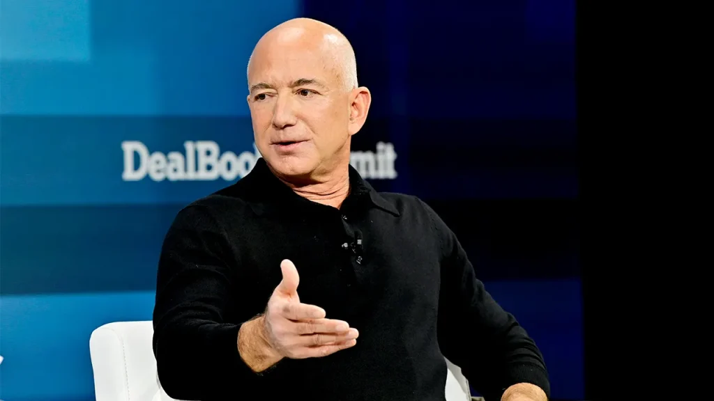 Top editor supports Bezos as critics express outrage over layoffs at the paper