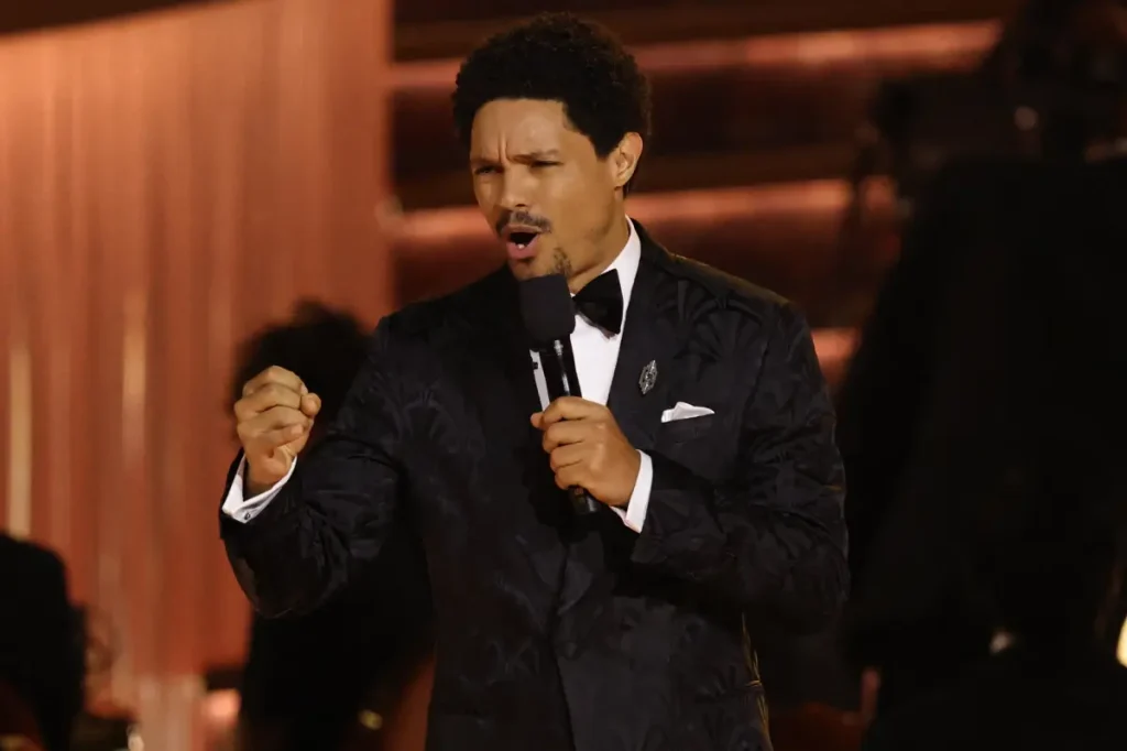 Trevor Noah critiques Jeff Bezos' wedding and Nicki Minaj's support for Trump in his 2026 Grammys speech.