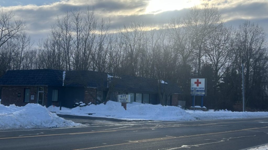 Two men face charges for health insurance fraud, and one is accused of pretending to be a doctor.