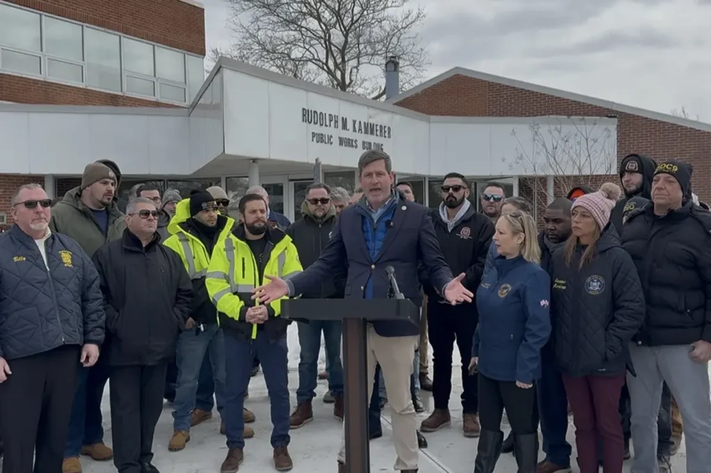 Union leaders and local Democrats criticize Suffolk County for terminating a 20-year contract in favor of a politically linked company.