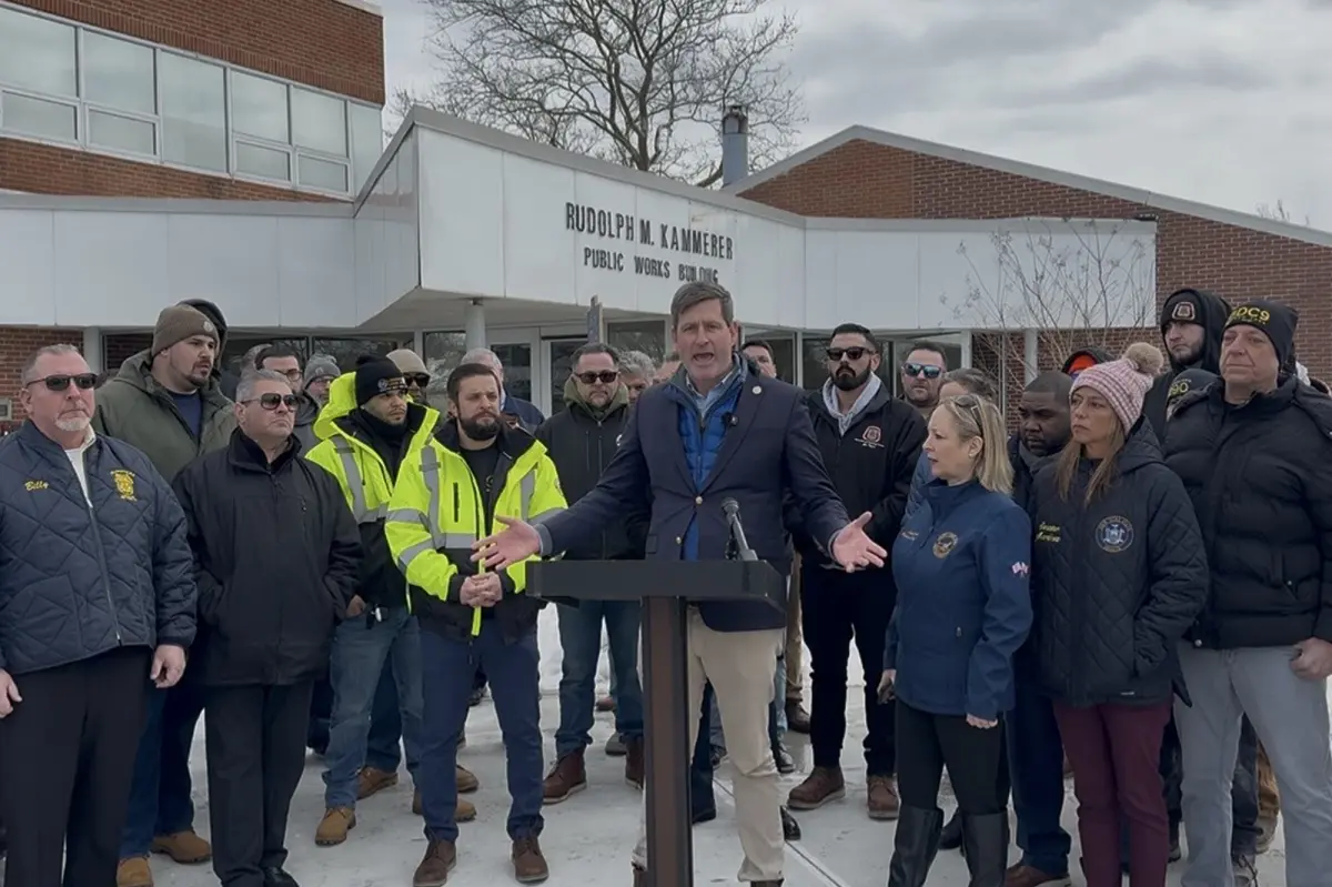 Union leaders and local Democrats criticize Suffolk County for terminating a 20-year contract in favor of a politically linked company.