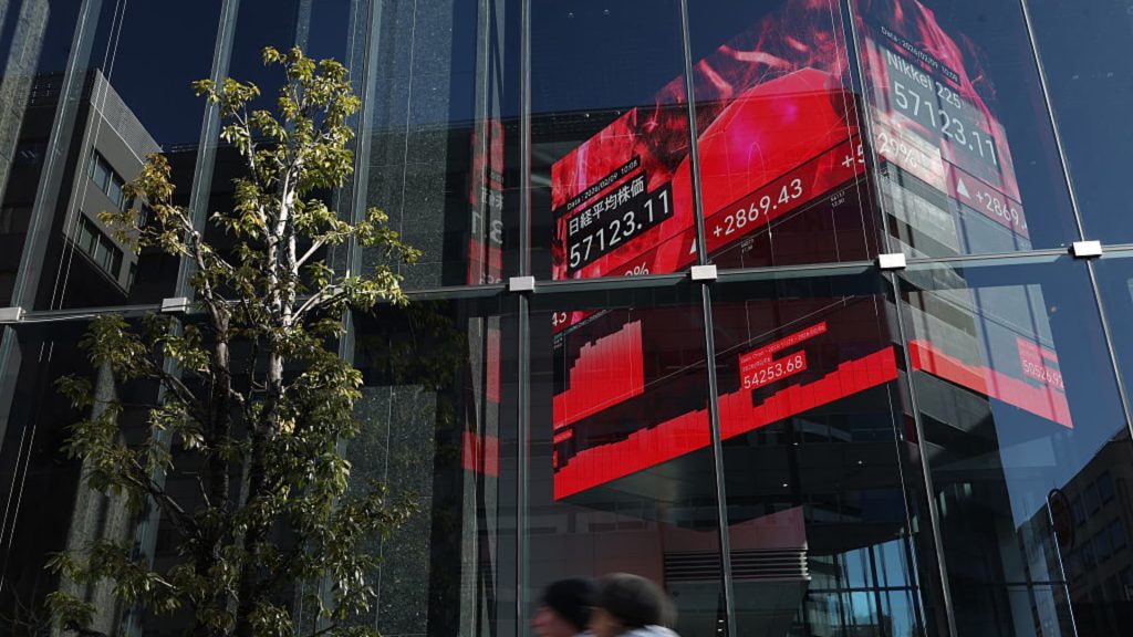 Asia-Pacific markets show mixed results as oil stays close to $100 with rising U.S.-Iran tensions.