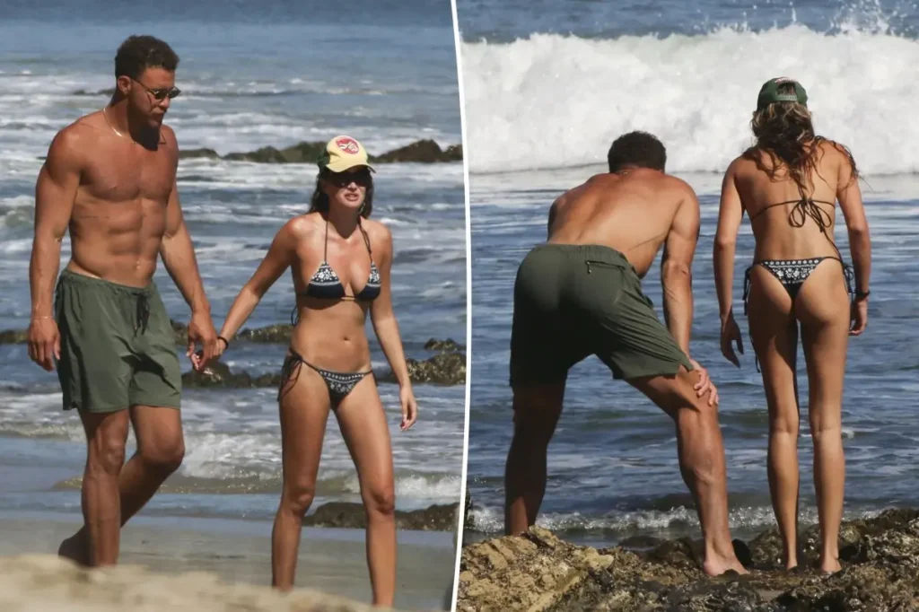 Blake Griffin spends time at the beach with his model fiancée after their private engagement.