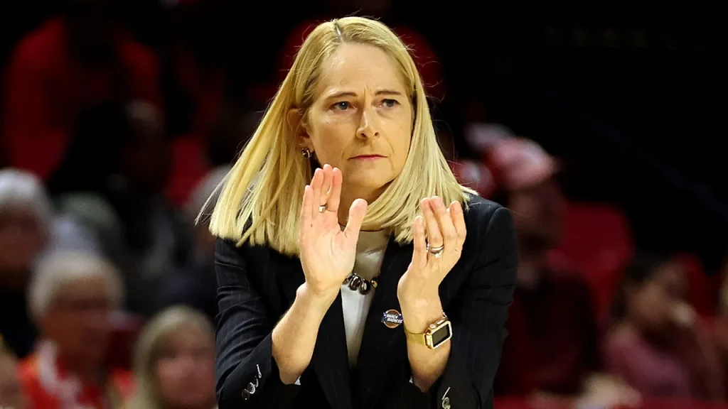 Brenda Freese and Oluchi Okananwa from Maryland share a memorable moment during the game