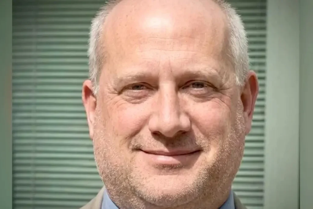 College dean paid 13-year-old boy for sex, police say