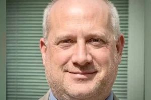 College dean paid 13-year-old boy for sex, police say