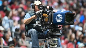 Executives say broadcasters need to merge to compete for NFL television rights.