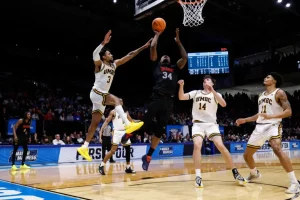 Howard narrowly defeats UMBC for its first NCAA Tournament victory.