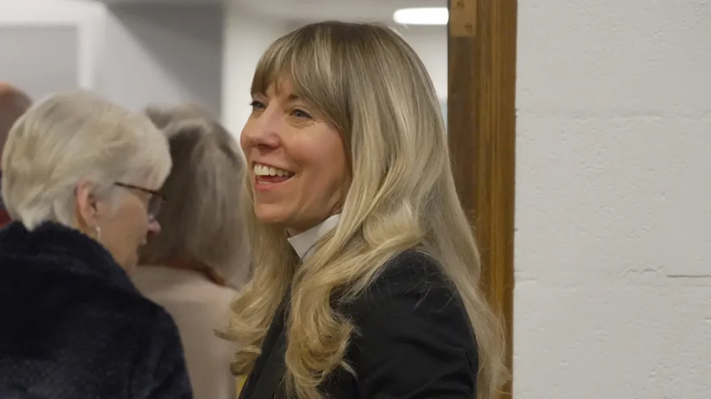 Iowa Democratic candidate connected faith to political violence and cautioned against public displays of religion in 2023.