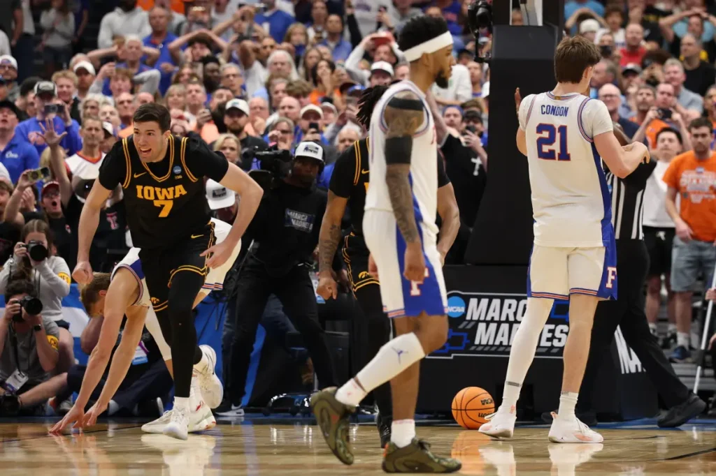Iowa upsets Florida as the first top seed is eliminated in March Madness