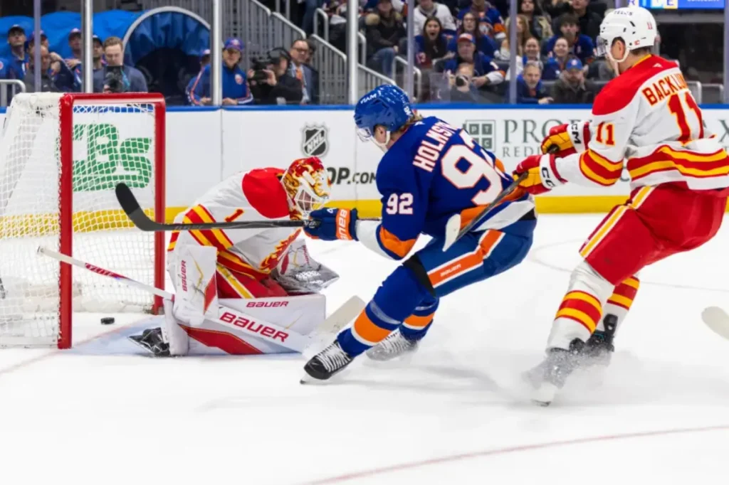 Islanders' fast start leads to victory over Flames