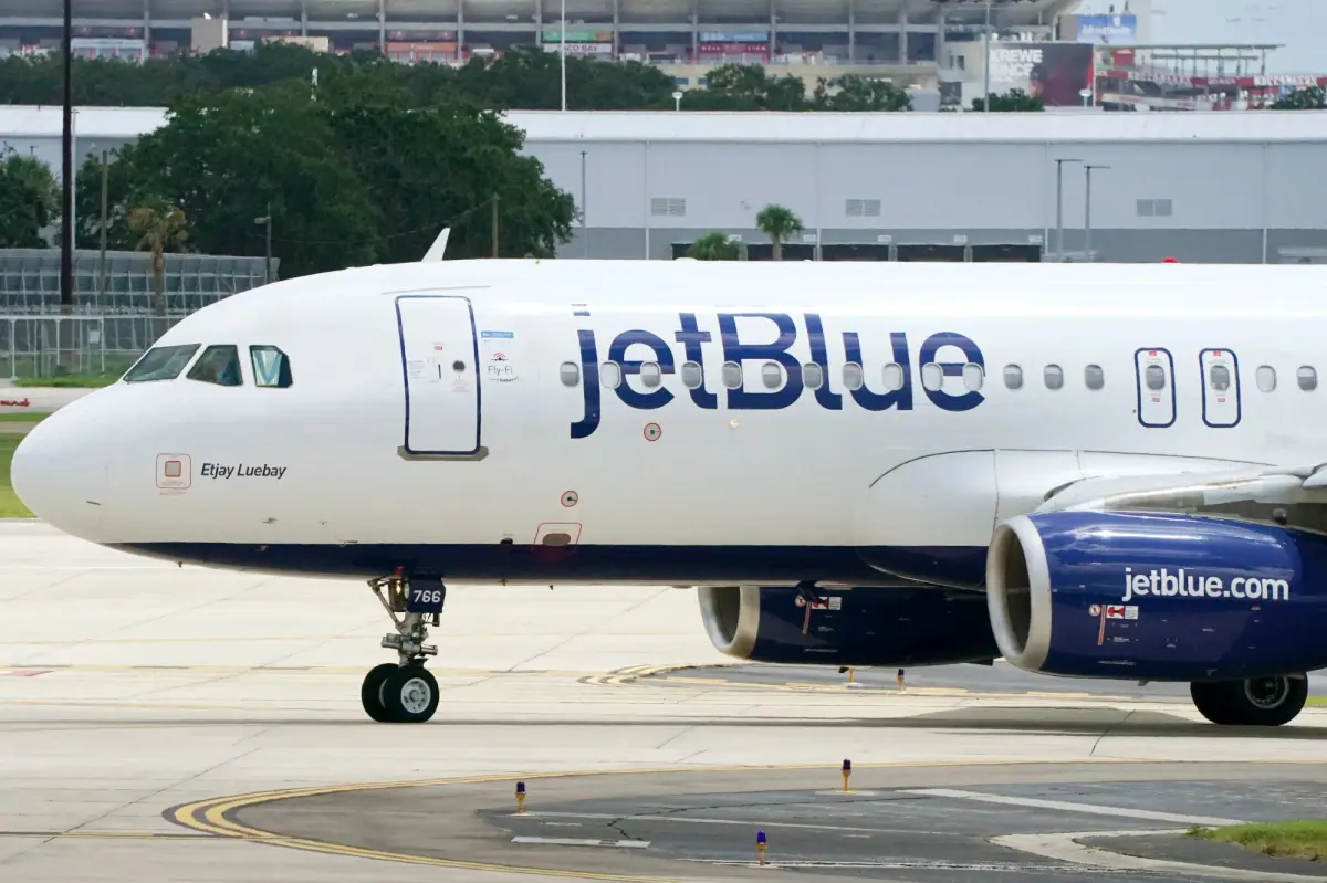 JetBlue stock rises after news that the airline is considering selling to competitors