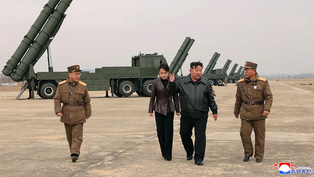 Kim Jong Un observes a North Korean weapons test alongside his teenage daughter.