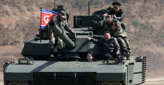 Kim Jong-un's Daughter Operates a Tank in North Korean Propaganda Photos