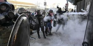 LA No Kings protest erupts into a violent clash as individuals hurl cement blocks at federal agents