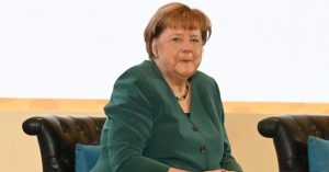 Merkel Criticized for Urging Migrants to Vote Against Populist AfD Party