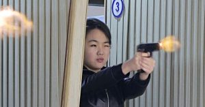 North Korea Shares Photos of Kim Jong-un and His Daughter Shooting Pistols