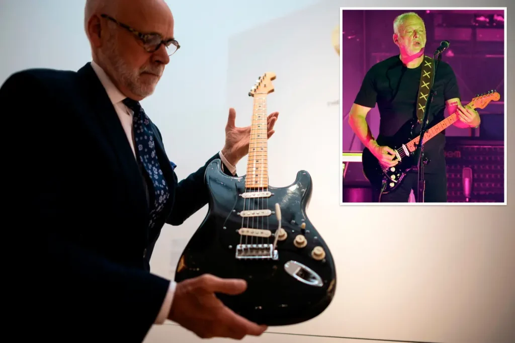 Pink Floyd's guitar breaks records at NYC auction, setting the mark for the most costly guitar ever sold.
