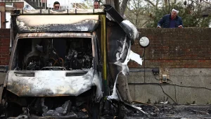 Police in the UK detain two people for suspected arson targeting Jewish ambulances motivated by antisemitism.