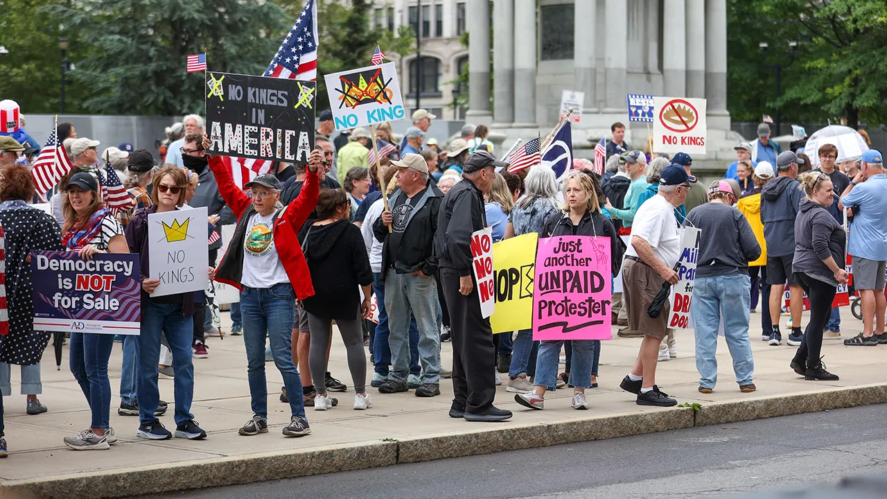Protesters in DC alter "America the Beautiful" during the battle over ICE and the government shutdown
