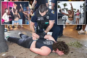 Spring breaker in Florida taken down and handcuffed as officials enforce rules against underage partying