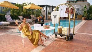 Staud Joins Forces with Amex to Celebrate 60 Years of the Gold Card Resort Collection