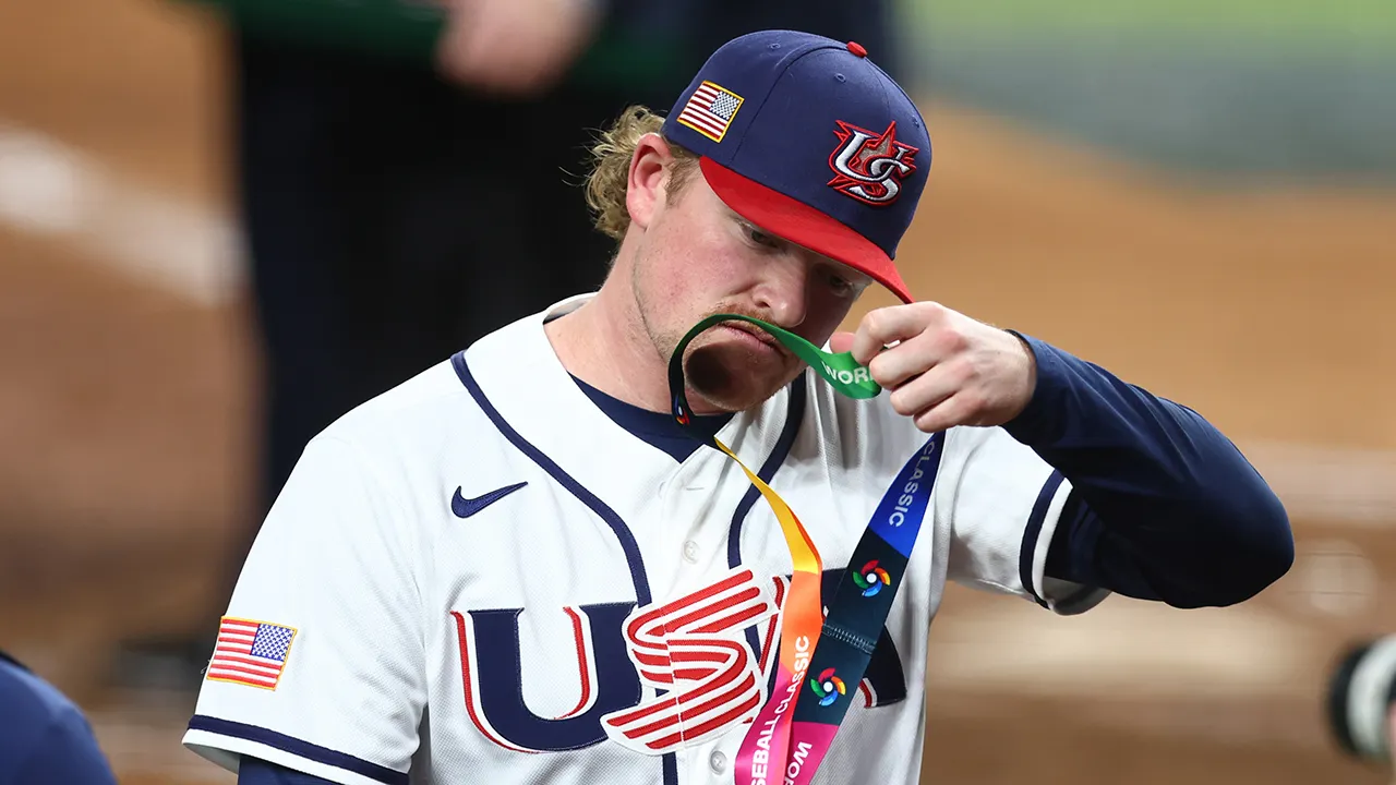 Team USA players take off their WBC silver medals