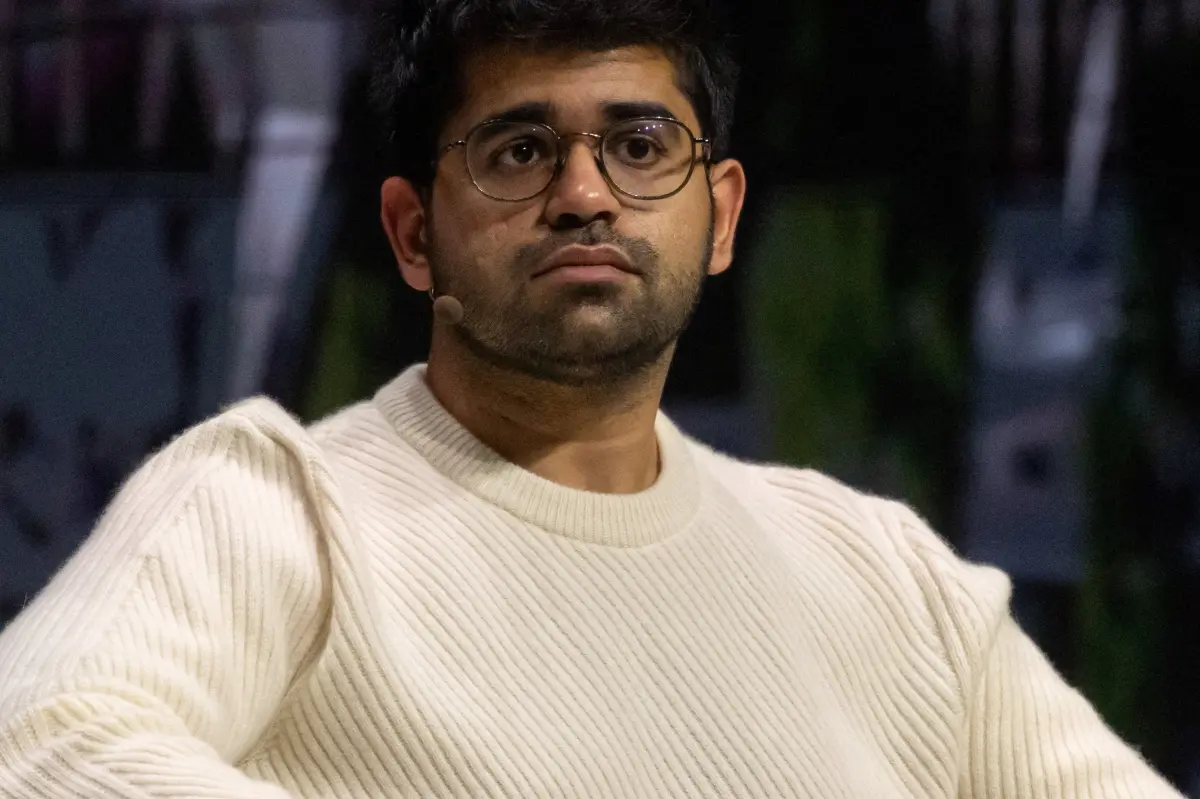 Tech CEO Aravind Srinivas criticized for claiming that AI job cuts are acceptable since people dislike their work.