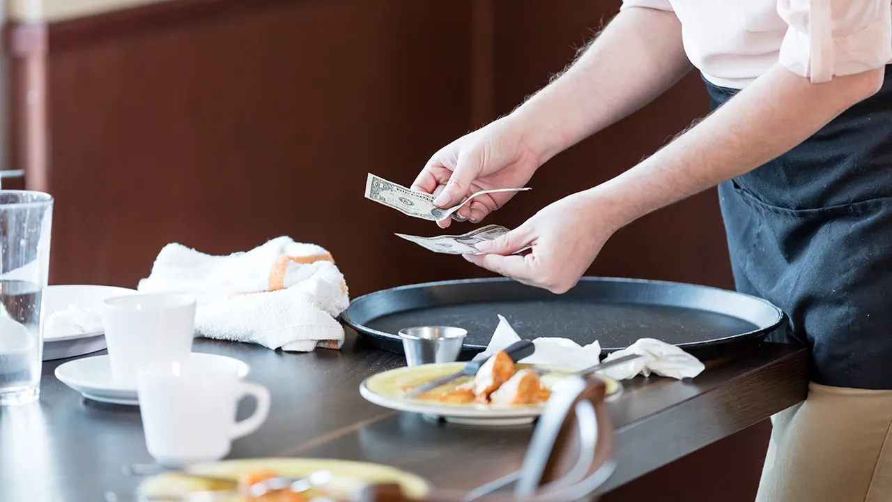 The trend of no-tip restaurants raises questions about service quality and employee wages.