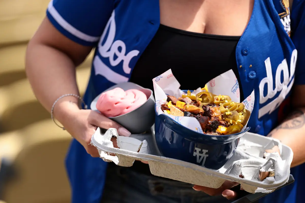 This is the amount of extra calories Dodgers fans eat on game day.