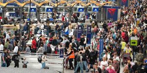 Travelers are waiting in line outside Atlanta airport due to the Democratic shutdown of the DHS.