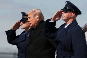 Trump participates in a solemn ceremony for six U.S. service members who died in a KC-135 crash in Iraq
