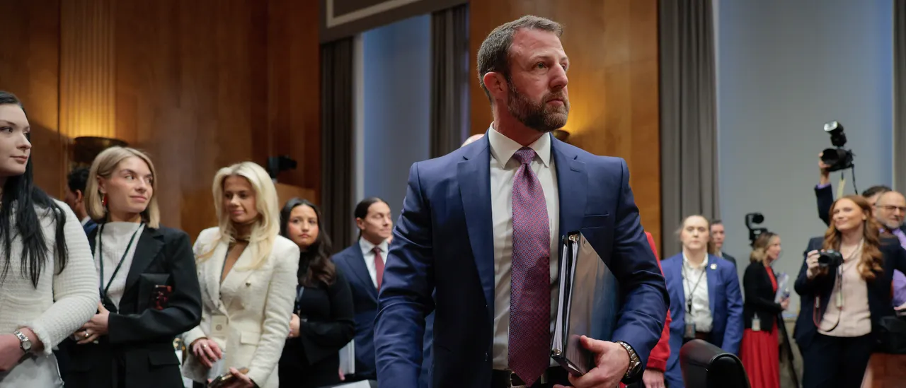 Trump's nominee for DHS explains when ICE agents require warrants for enforcement as talks to avoid a shutdown are delayed.