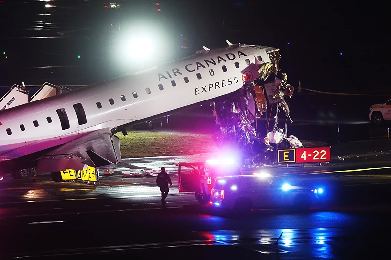 Two pilots killed and over 40 injured after Air Canada aircraft collides with fire truck at LaGuardia
