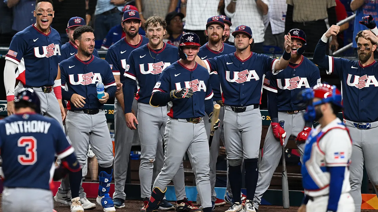 US team receives game-worn Olympic jerseys from gold medal winners during World Baseball Classic