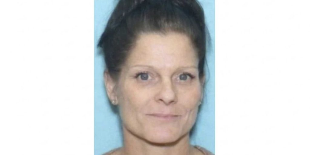 Woman missing for more than a year discovered buried under a garage following a disturbing lead from a friend's tip to the suspect, according to the district attorney.